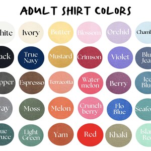 May include: A color chart titled "ADULT SHIRT COLORS" displays a variety of shirt colors. The colors are arranged in circular swatches, including white, black, navy, mustard, red, and many more. The text labels each color.