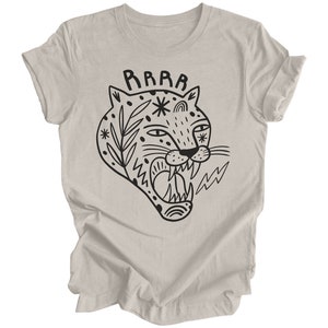 May include: A heather grey t-shirt with a black and white illustration of a roaring tiger with the word "RAWR" above it.