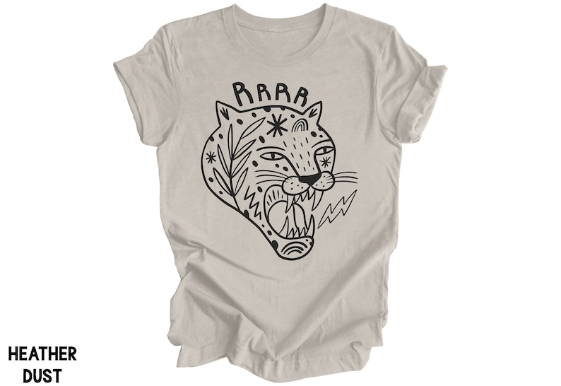 May include: A heather grey t-shirt with a black and white illustration of a roaring tiger with the word "RAWR" above it.