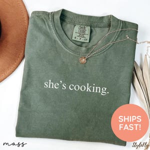 She’s Cooking Shirt, Cooking Tee, Cooking T-Shirt, Chef Mom Shirt, Home Cooking Shirt, Shirt for Chef, Chef T-Shirt, Gift for Chef