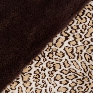 May include: A diagonal split image showcasing two distinct textures. One side features a plush, dark brown faux fur, while the other displays a cream-colored fabric with a brown leopard print pattern. The contrast highlights the different textures.
