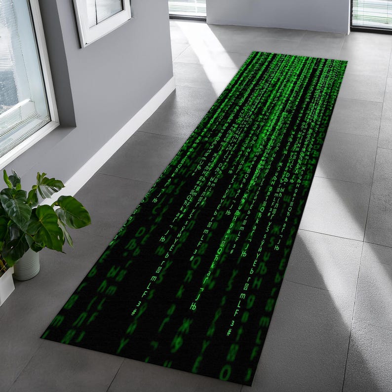 May include: A black and green runner rug with a repeating pattern of green code on a black background.