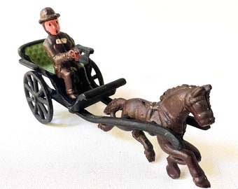 Vintage cast iron horse and buggy