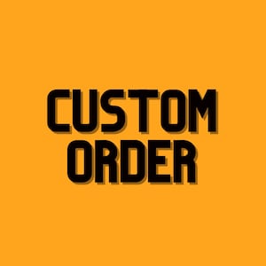 May include: The words "CUSTOM ORDER" are displayed in bold, black letters against a bright orange background. The text has a subtle shadow effect, enhancing its visibility.