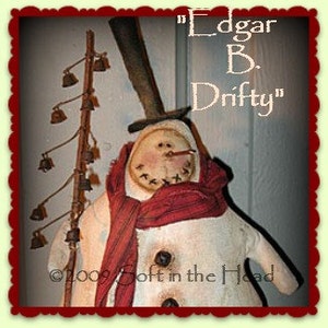 May include: A white snowman with a red and white striped scarf, a black top hat, and a carrot nose. The snowman is holding a stick with bells attached. The snowman is labeled "Edgar B. Drifty".