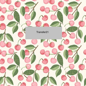 May include: A seamless pattern featuring pink cherries with green leaves on a white background. The text "Transfer21" is in the center of the image.