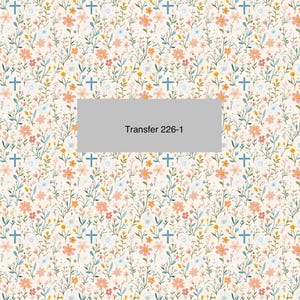 May include: A floral pattern featuring a cream background with scattered flowers in shades of peach, blue, and white, interspersed with blue crosses. The text "Transfer 226-1" is displayed on a gray rectangular block.