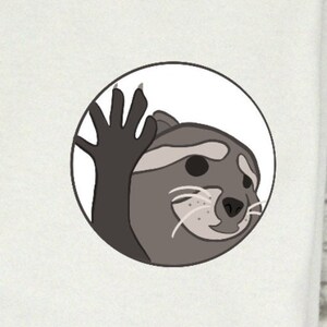 May include: A cartoon raccoon with a gray and brown fur pattern waves with its right paw. The raccoon is looking to the right and has a friendly expression. The raccoon is inside a white circle.