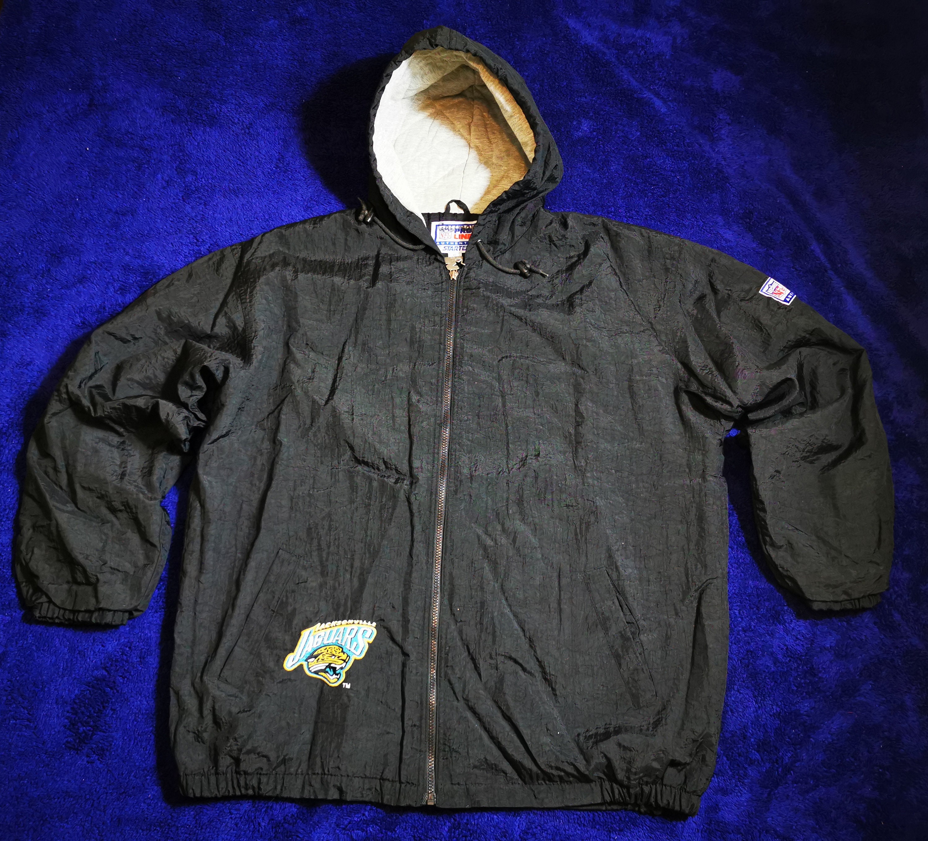 90年代 NFL JAGUARS ハーフジップ スタジアムジャケット 古着 90年代 APEX ONE NFL JACKSONVILLE JAGUARS ジャクソンビル