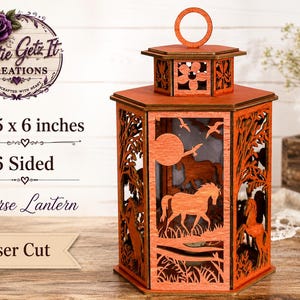 May include: A six-sided wooden lantern measuring 10.5 x 6 inches, featuring laser-cut panels with horse silhouettes, trees, and a moon. The structure includes a top handle and intricate cutouts of floral patterns on the upper hexagonal tier.