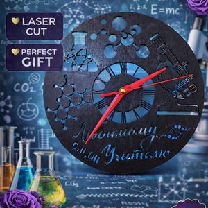 May include: A white ceramic mug with a black handle and the text "But First, Coffee" in a bold, black font. The mug is set against a blurred background, highlighting its clean design.