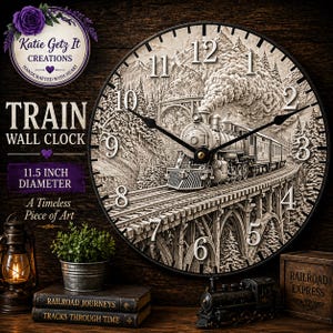 May include: A black and white train wall clock with a detailed illustration of a steam train on a bridge. The clock face is 11.5 inches in diameter and features large white numerals. The clock has the text "TRAIN WALL CLOCK" and "A Timeless Piece of Art".