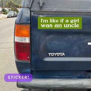 May include: A blue pickup truck with a green sticker that reads "I'm like if a girl was an uncle".