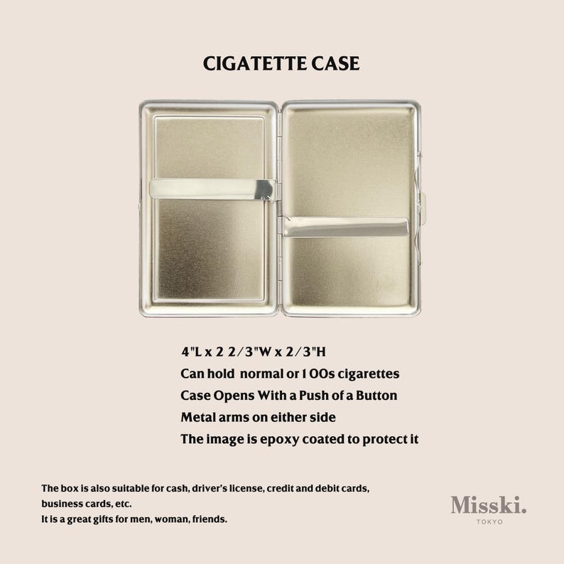May include: Open metal cigarette case, labeled "CIGATETTE CASE." The case is 4" long, 2 2/3" wide, and 2/3" high. It opens with a button and has metal arms. The image is epoxy coated. Can hold normal or 100s cigarettes.