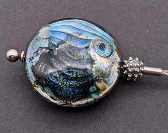 Lentil shaped glass bead-Astrid Riedel