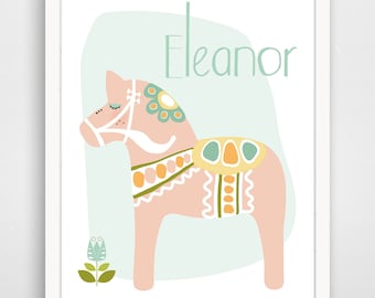 May include: A light blue and pink illustration of a Dala horse with green, yellow, and orange details. The name "Eleanor" is written in green above the horse.