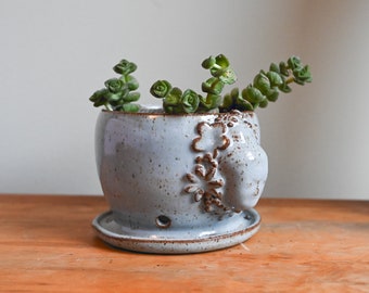 Light Blue Buddha Face Planter with Attached Saucer, Handmade Ceramic Plant Pot, Drainage Holes, 3 inches tall, Potters Wheel Thrown