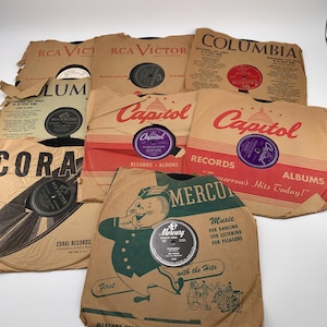 Lot of 8 Vintage 78 rpm records in vintage sleeves
