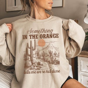 Something In The Orange Tells Me We&#39;re Not Done Shirt Gift For Country Music Lover, Western Concert Sweatshirt, Rodeo T-Shirt, Cowboy Outfit