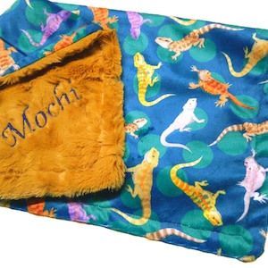 May include: A white ceramic mug with a black handle and the text "But First, Coffee" in a black, bold font. The mug is sitting on a wooden surface. The mug is 4 inches tall.