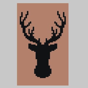 May include: A pixelated black silhouette of a stag's head and antlers against a brown background. The stag is centered, with detailed antlers and a prominent neck. The background is a solid, muted brown.