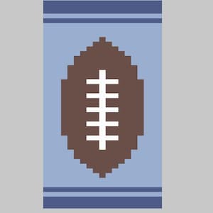 May include: A rectangular, pixelated rug design featuring a brown football shape with white stitching in the center. The rug has a light blue background with darker blue stripes at the top and bottom.