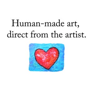 Op de afbeelding: Een rechthoekig kunstwerk met een felrood hart in het midden op een getextureerde blauwe achtergrond. Boven het hart staat de tekst: Human-made art, direct from the artist. Het hart vertoont zichtbare penseelstreken en diverse roodtinten.