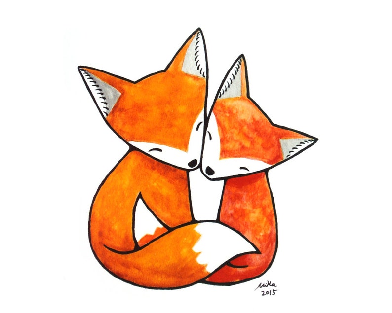 Bright orange fox couple snuggling.