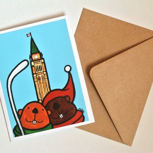 Carte J'aime le Canada, cadeau canadien, carte de soutien Canada, carte d'anniversaire canadienne, castors de hockey mignons, art populaire canadien, carte fabriquée au Canada