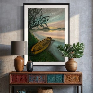 May include: A painting of a calm lake with a small wooden boat resting on the water. The sky is a soft blue with hints of pink and orange, suggesting a sunrise or sunset. The scene is peaceful and serene.