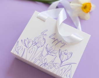Caja de regalo de cartón con estampado floral: Caja deslizante con asas de satén.