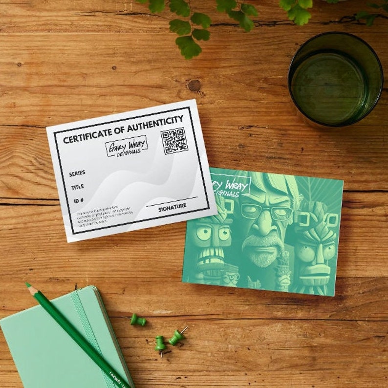May include: A certificate of authenticity for a Gary Wray Originals print. The certificate is white with black text and a black and white QR code. The certificate is next to a green print featuring a cartoon character with a large nose and glasses.