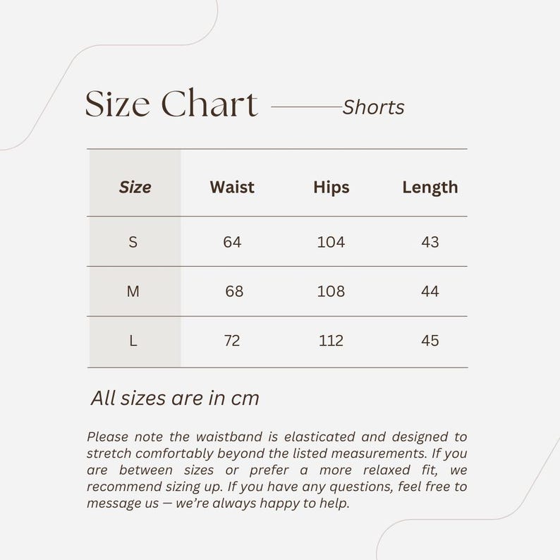 May include: Size chart for shorts, with measurements in centimeters. Sizes S, M, and L are listed, with waist, hips, and length measurements provided. The text states the waistband is elasticated and designed to stretch.