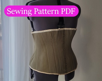May include: A green corset with a white lace trim and a row of buttons down the back. Sewing Pattern PDF.