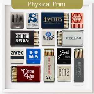 May include: A white framed print of a collection of matchboxes with various restaurant and bar logos. The matchboxes are arranged in a grid pattern. The logos include RPM, Sunda, Bavettes, Portillo's, Sushi-San, Mr. Beef, Gilt Bar, Avec, Doma, Gene & Georgetti, Joe's, Ciccio Mio, Ema, and Beatrix.