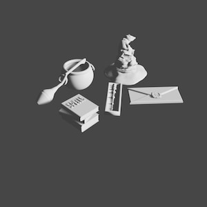 以下が含まれることがあります： 白い3Dプリントされたオブジェクトのコレクション。スプーン付きの大釜、組み分け帽子、「Spells」という単語が書かれた2冊の本、杖、ワックスシール付きの封筒が含まれています。オブジェクトは濃い灰色の表面に配置されています。