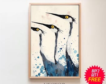 May include: A framed watercolour painting of three blue herons with yellow eyes, set against a white background with blue watercolour splatters. The painting is titled "VECTOR ART STUDIO".