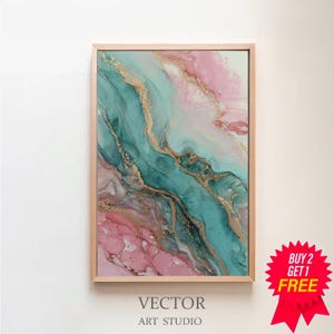 May include: Abstract art print in a wooden frame. The artwork features flowing teal, pink, and gold colors. The text "VECTOR ART STUDIO" is at the bottom. A red sticker with "BUY 2 GET 1 FREE" is in the bottom right corner.