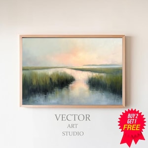May include: A painting of a calm river scene with a soft pink and blue sky. The river is surrounded by green marsh grasses and the water reflects the colors of the sky. The painting is framed in a light wood frame.