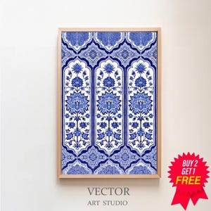 May include: Framed wall art featuring a blue and white floral pattern. The artwork has a symmetrical design with stylized flowers and geometric shapes. The frame is a light wood color. The text "VECTOR ART STUDIO" is at the bottom.