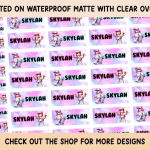 May include: A set of 12 waterproof matte stickers with a clear overlay. Each sticker features a pink and blue background with a cartoon character and the name "Skylah" in pink text.