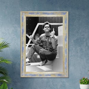 Jim Carrey Middle Finger Pose - Funny Vintage Framed Print for Retro Pop Culture Wall Decor and Unique Comedy-Inspired Home Art