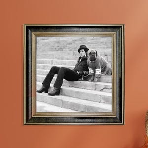Rocky Balboa and His Dog Resting on the Stairs, Vintage Framed Print, Iconic Moment from the Classic 1976 Boxing Movie