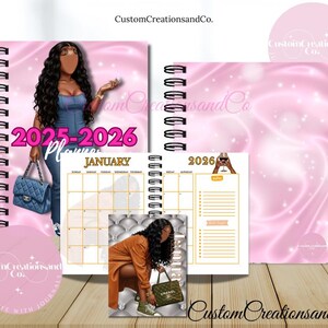 May include: A spiral-bound planner with a pink cover featuring an illustration of a woman and the text "2025-2026 Planner." The open planner shows a calendar for January 2026 and a lined notes page. The planner has a pink background.
