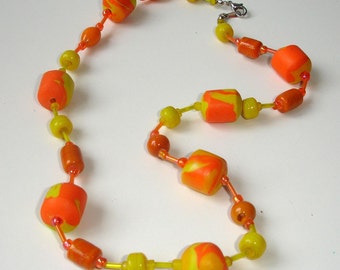 Polymer clay necklace in orange and yellow