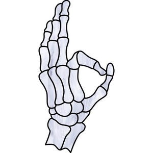 May include: A skeletal hand with a white and gray watercolor effect, making an OK sign.