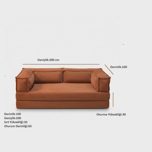 May include: A brown corduroy sofa with dimensions displayed in the image. The sofa is 200 cm wide, 100 cm deep, and has a seat height of 30 cm. The back height is 32 cm, and the seat depth is 65 cm.