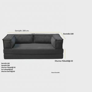 Peut inclure: Un canap&eacute; modulaire gris fonc&eacute; avec des dimensions en cm. Le canap&eacute; mesure 200 cm de large, 100 cm de profondeur et 32 cm de hauteur au niveau de l'assise. Le dossier mesure 65 cm de haut. Le texte de l'image indique "Repr&eacute;sentation visuelle."
