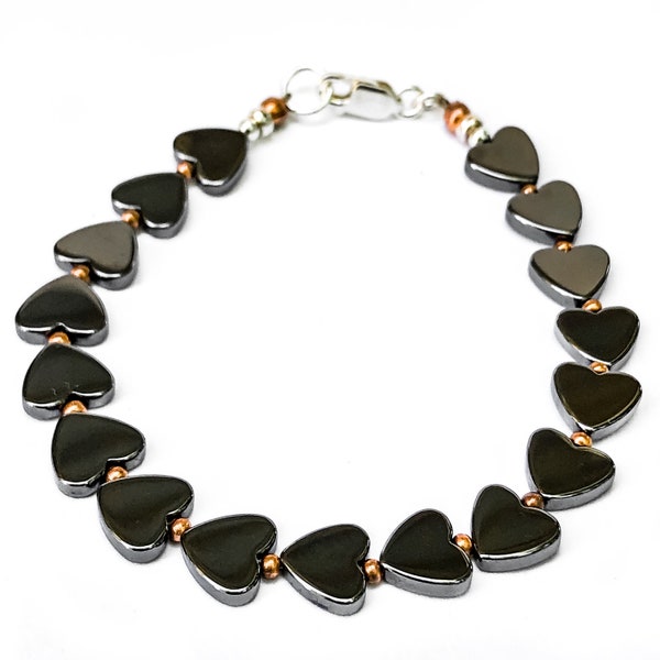 FACETED HEMATITE 2MM BEAD BRACELET W/ SMALL INSPIRE GOLD CHARM main image 0