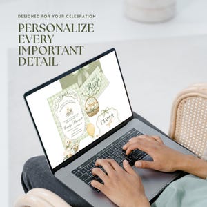 Person editing the sage green baby shower website on a laptop, demonstrating that important invitation details can be personalized in Canva.